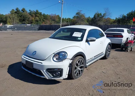 2016 Volkswagen Beetle 1.8T Dune z USA, uszkodzony, nr VIN 3VWS17AT5GM631743